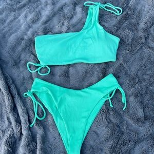 Blue swimsuit worn barely